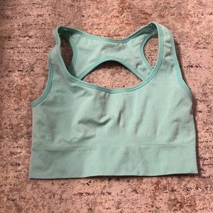 NVGTN sport bra. Teal/aqua/blue size small